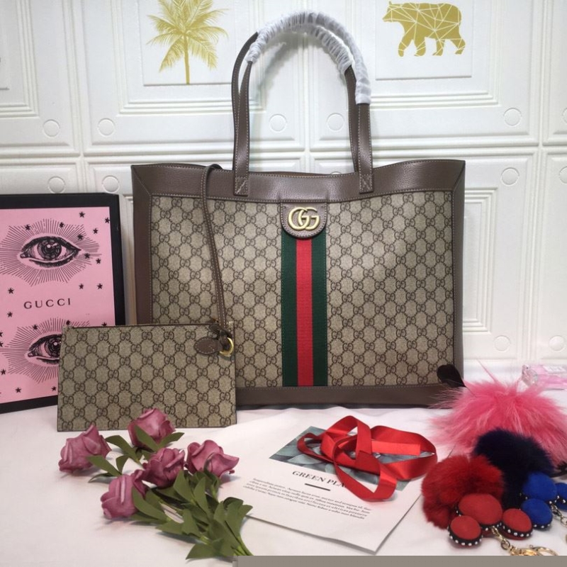 G*u*i shopping bags